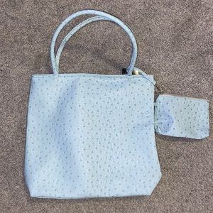 Light blue women’s ostrich tote bag with wristlet